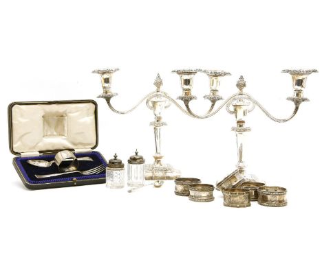 A cased silver christening set, Sheffield 1922, John Round, comprising a spoon, fork and napkin ring, together with six silve
