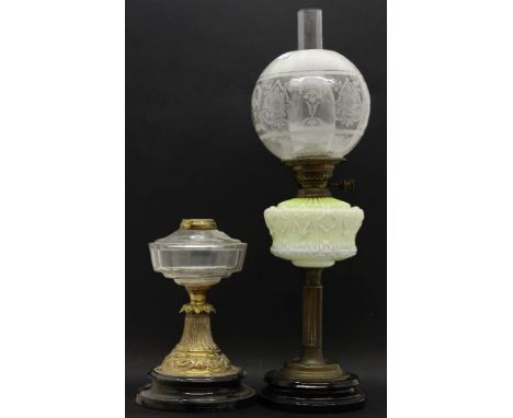 A Victorian oil lamp, with an opaline glass reservoir and acid etched shade, along with a Victorian brass and clear glass lam
