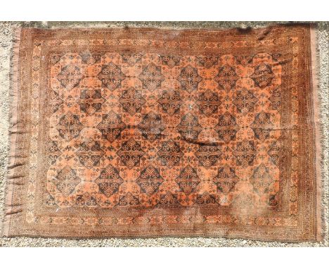 A Persian carpet, orange ground