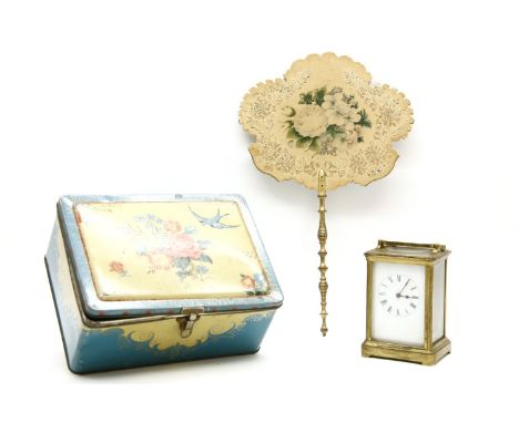 A 19th century brass cased carriage clock, (damage to dial), 15 cm high, one fan and a tin box