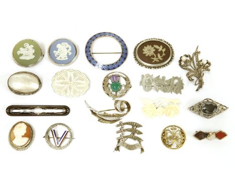 A collection of assorted brooches, to include a blue, white and red 'V' enamel circular brooch, marked silver, a two tone cub