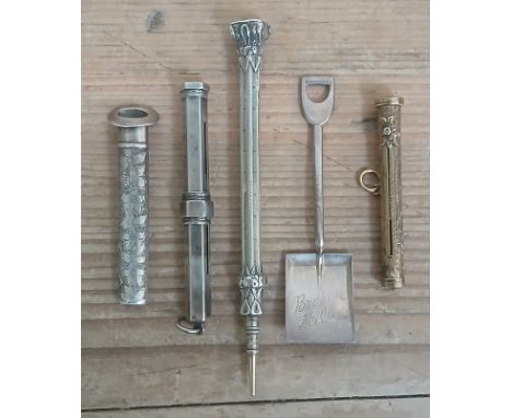 A mixed lot comprising a hallmarked silver lapel posy holder, two hallmarked silver propelling pencils (one by S Mordan &amp;