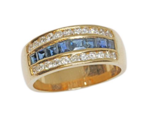 A THREE ROW DIAMOND AND SAPPHIRE RING, channel set square stepped cut sapphires set between two rows of round brilliant cut d