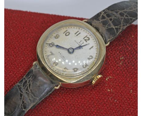 OMEGA, a ladies vintage 9ct gold wristwatch, ref. 6460, 15 jewel manual wind movement, case diameter 26mm, leather strap and 
