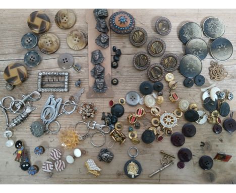 A box of assorted mainly vintage buttons, badges including Robertsons, yellow metal etc.
