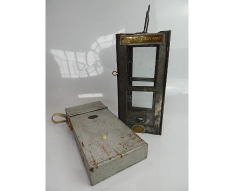 A vintage galvanised workman's candle lantern by Fountayne L & E Co Ltd of Tottenham, c1914, and a candle carrying case, (2).