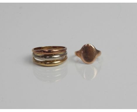 Two dress rings, a tricolour band and a unmonogrammed signet ring,  yellow metal marked 9ct, 7.6g.