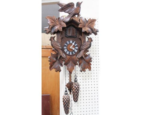 A modern German Black Forest style cuckoo clock, 40cm.