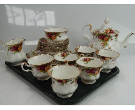 A Royal Albert Old Country Roses tea service, including teapot, and six cups, six saucers, six side plates, bread and butter 