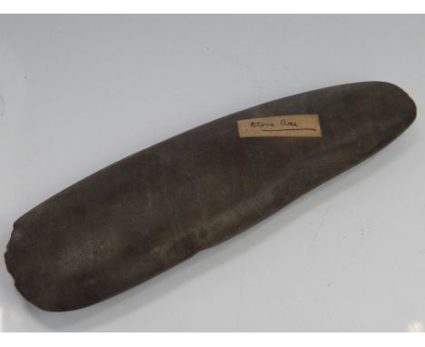 A stone axe head.