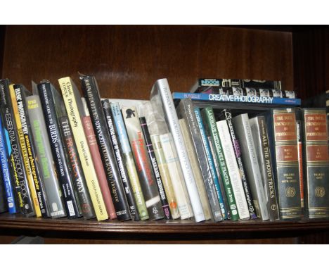 A shelf of books on photography.