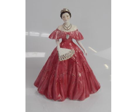 A Royal Worcester figure of Queen Elizabeth The Queen Mother, 22.5cm high, with loose plinth base.
