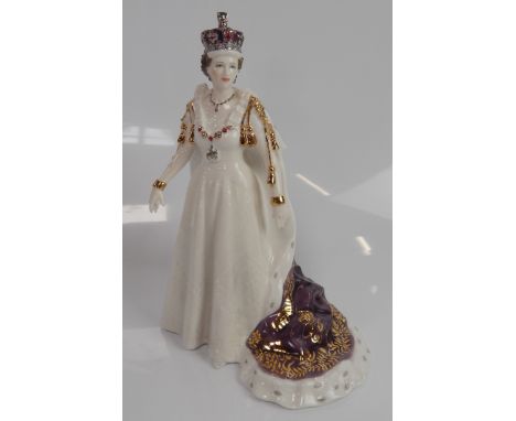 A Royal Worcester figure of Queen Elizabeth II, 14.5cm high.
