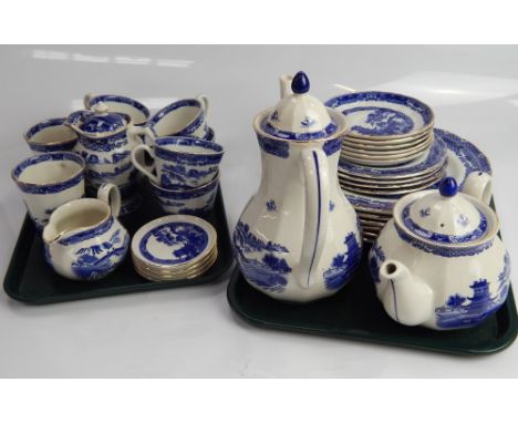 A Ringtons blue and white willow pattern part dinner, tea and coffee service, (2 trays).