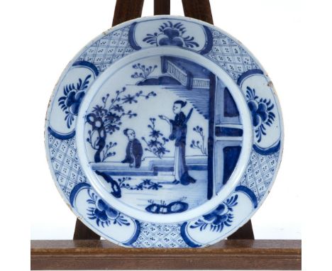 Delftware charger circa 1800, painted in the Chinese Kangxi style, 34.5cm across
