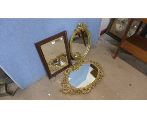Two gilt framed mirrors and an oak mirror 