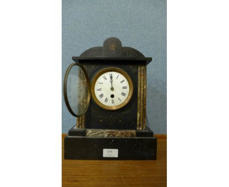 A 19th Century French Belge noir mantel clock 