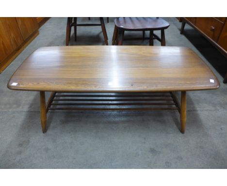 An Ercol Golden Dawn elm coffee table 