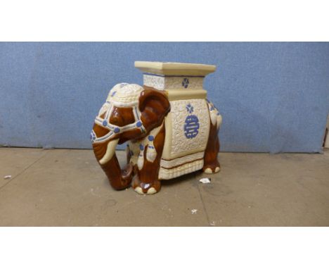 A ceramic elephant garden stool 