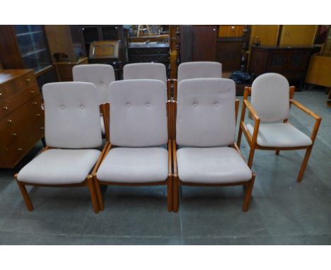 A Suite of seven Ercol beech and upholstered chairs 