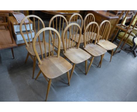 A set of eight Ercol Blonde Windsor chairs, one a/f 