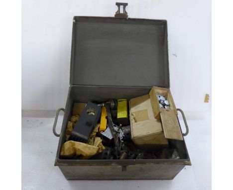 A collection of projector spares in a steel chest 