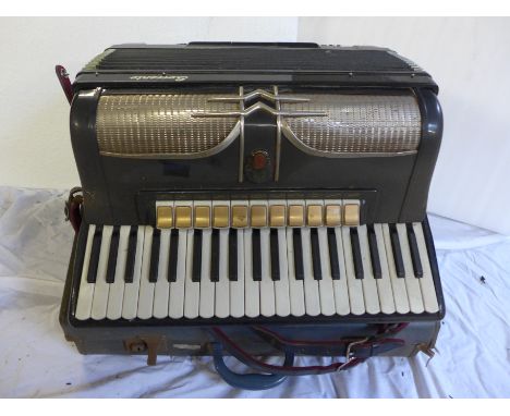 A Sorrento accordion and case 