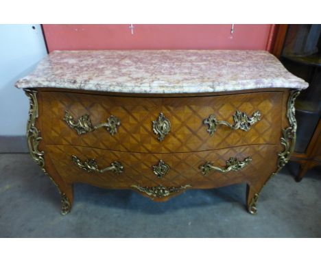 A French Louis XV style parquetry rosewood, gilt metal and marble topped bombe shaped commode, 83cms h, 130cms w, 59cms d 
