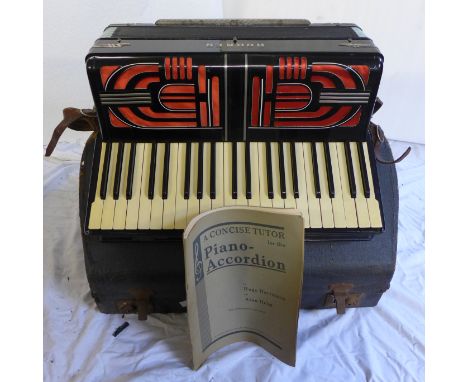 A Hohner Tango V accordion and case 