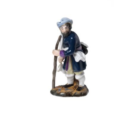 A Porcelain Figurine of a Traveller KORNILOV MANUFACTORY, ST PETERSBURG, SECOND HALF 19TH CENTURY  Height 11.5 cm.  Realistic