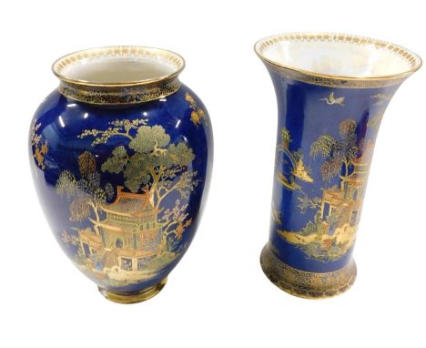 A Carltonware blue lustre vase, decorated with oriental scenes, picked out in gilt, 24cm high, and a similar flared vase. (2)