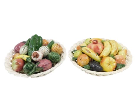 Two similar Spanish pottery lattice work bowls, each filled with ceramic fruit and vegetables, 32cm diameter.