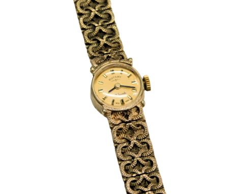 A Rotary ladies 9ct cased wristwatch, circular dial with batton markers, twenty-one jewel movement, on fancy link bracelet st