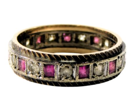 A ruby and CZ eternity ring, in white and yellow metal, unmarked, size P, 4.3g.