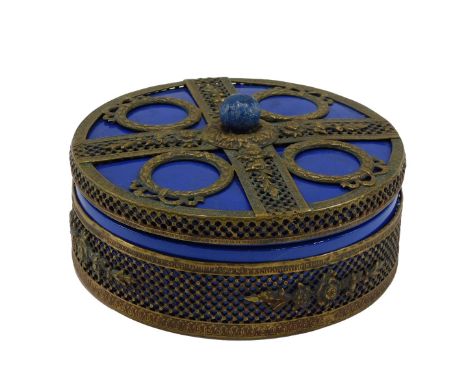 A Continental blue ceramic powder bowl and cover, with bronzed metal mounts, indistinctly stamped to underside Made in Czecho