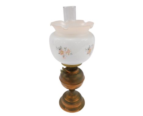 A copper oil lamp, with opaque floral decorated shade. 