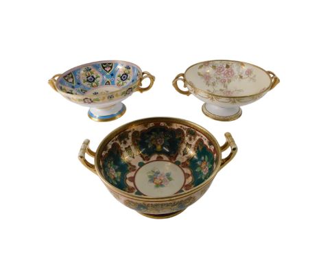 A Noritake two handled bowl, decorated with flowers, 30cm wide, and a similar bowl, decorated in Islamic style, and a smaller