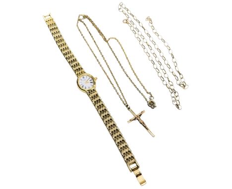 A 9ct gold crucifix pendant, approximately 2.0g, on a plated 9ct gold belcher link neck chain, on a bolt ring clasp, 2.7g, 48