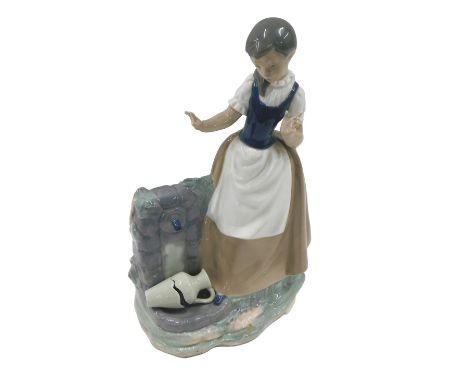 A Nao porcelain figure, of a young girl collecting water with a broken jug, 30cm high, boxed.