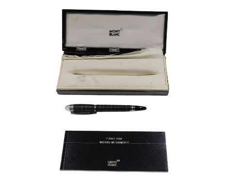 A Mont Blanc Starwalker metal and rubber ballpoint pen, in fitted box, with spare stopper, instructions, etc. (box AF)