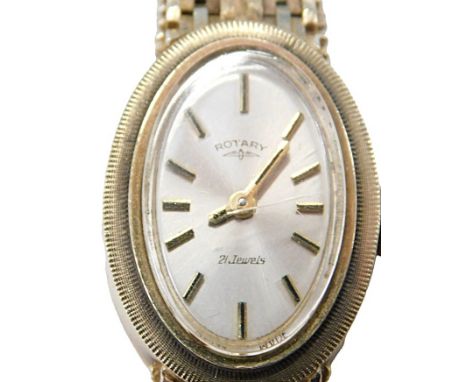 A Rotary ladies 9ct gold cased wristwatch, oval silvered dial, with batton markers, twenty-one jewel movement, the case of pl