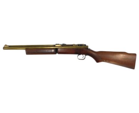 A Benjamin Franklin model 324 .22 calibre brass barrelled American air rifle, with adjustable foresight, and bolt action load