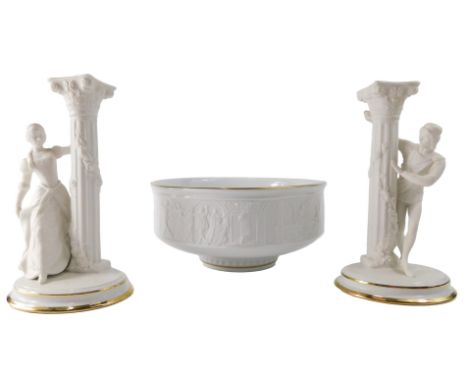 A Franklin Mint Romeo &amp; Juliet part bisque glazed bowl, 26cm high, and a pair of Romeo &amp; Juliet candlesticks. (3)