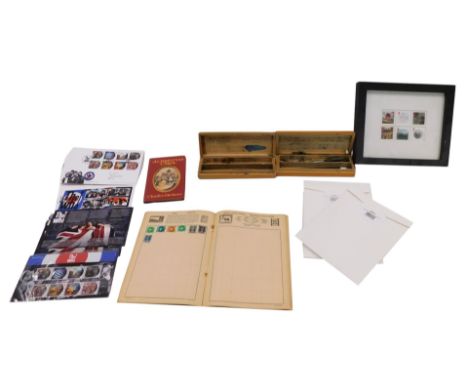 The Who first day covers, a stamp book, a copy of A Christmas Carol, two commerorative coins, etc.