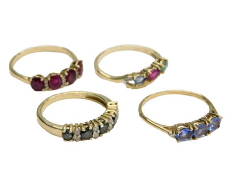 A 9ct gold and ruby four stone ring, set with pairs of tiny diamonds at intervals, size Q, and three further gem set rings, s