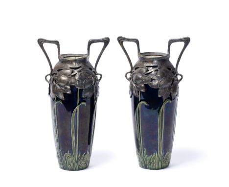 Manner of Zsolnay Pair of Art Nouveau vases, circa 1900 the pottery vases with lustre glaze decorated with reeds, pewter moun