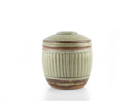 Richard Batterham (b.1936) Jar and cover green ash glaze, fluted sides painted mark 12.5cm high.