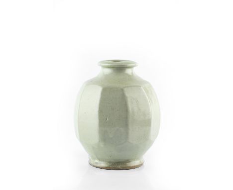 Mike Dodd (b.1943) Vase light celadon glaze, faceted sides impressed potter's seal 15.6cm high.