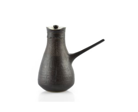 Lucie Rie (1902-1995) Coffee pot manganese glaze, sgraffito decoration impressed potter's seal 20.5cm high.