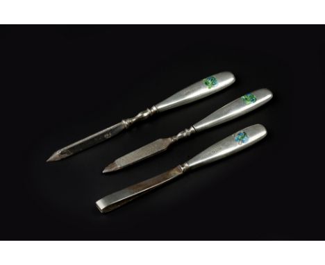 Archibald Knox (1864 - 1933) for Liberty &amp; Co. 'Cymric' silver mounted manicure and pedicure set with enamel Celtic knot 